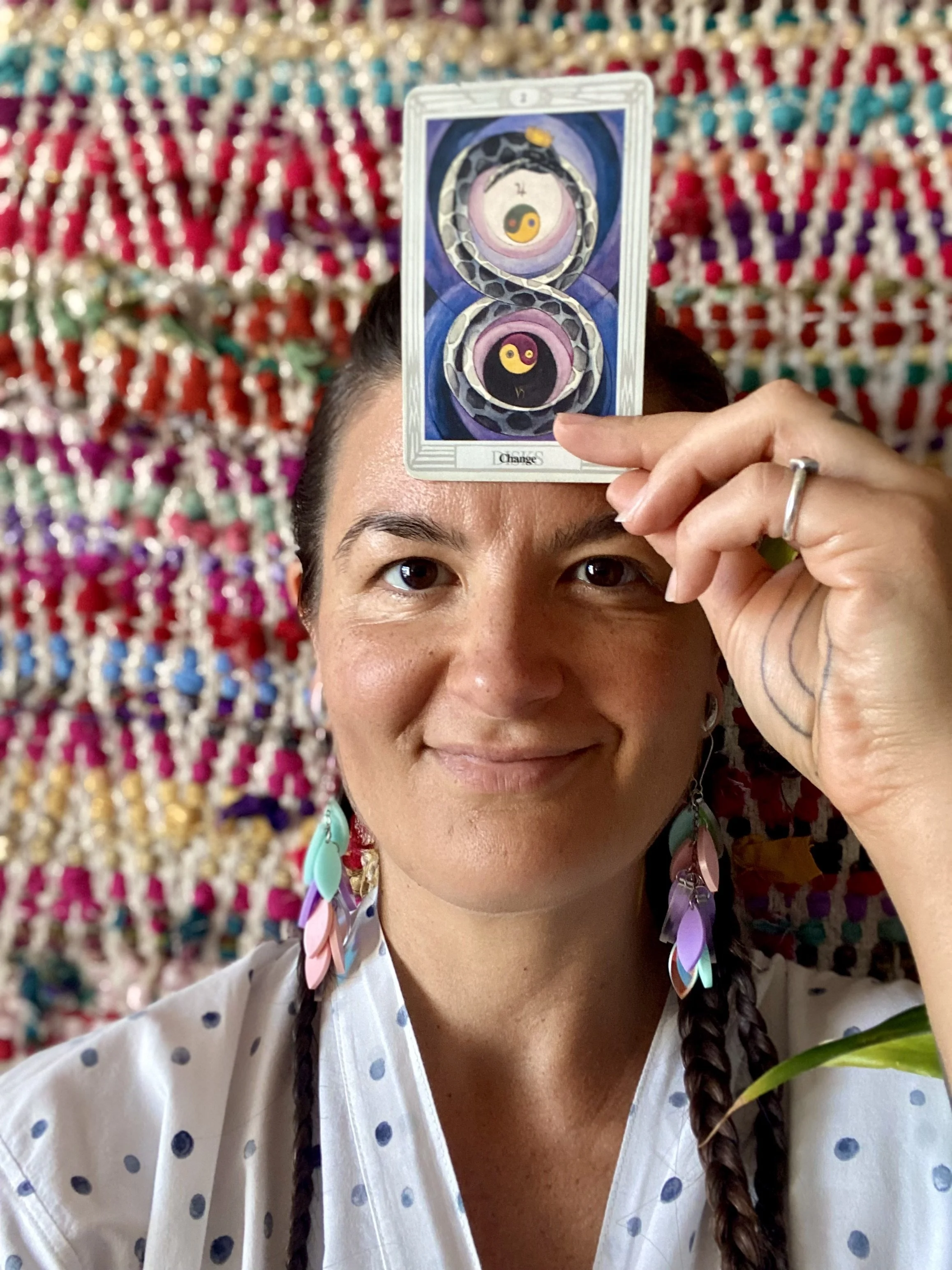 Megan with the Two of Pentacles from the Thoth Deck.