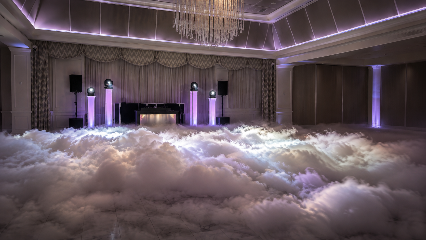 Dance floor with low-lying fog and uplighting