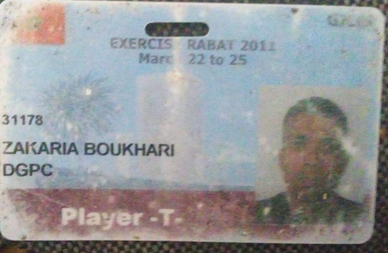 An identification card for exercise rabat from March 22 to 25, 2011, belonging to Zakaria Boukhari, with a photo of a man in formal attire.