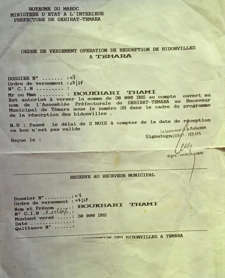 Official document from Morocco's Ministry of Interior authorizing a payment of 30,000 DHS to Boukhari Thami for a bidonville (shantytown) operation in Temara, with signatures and details of the transaction.