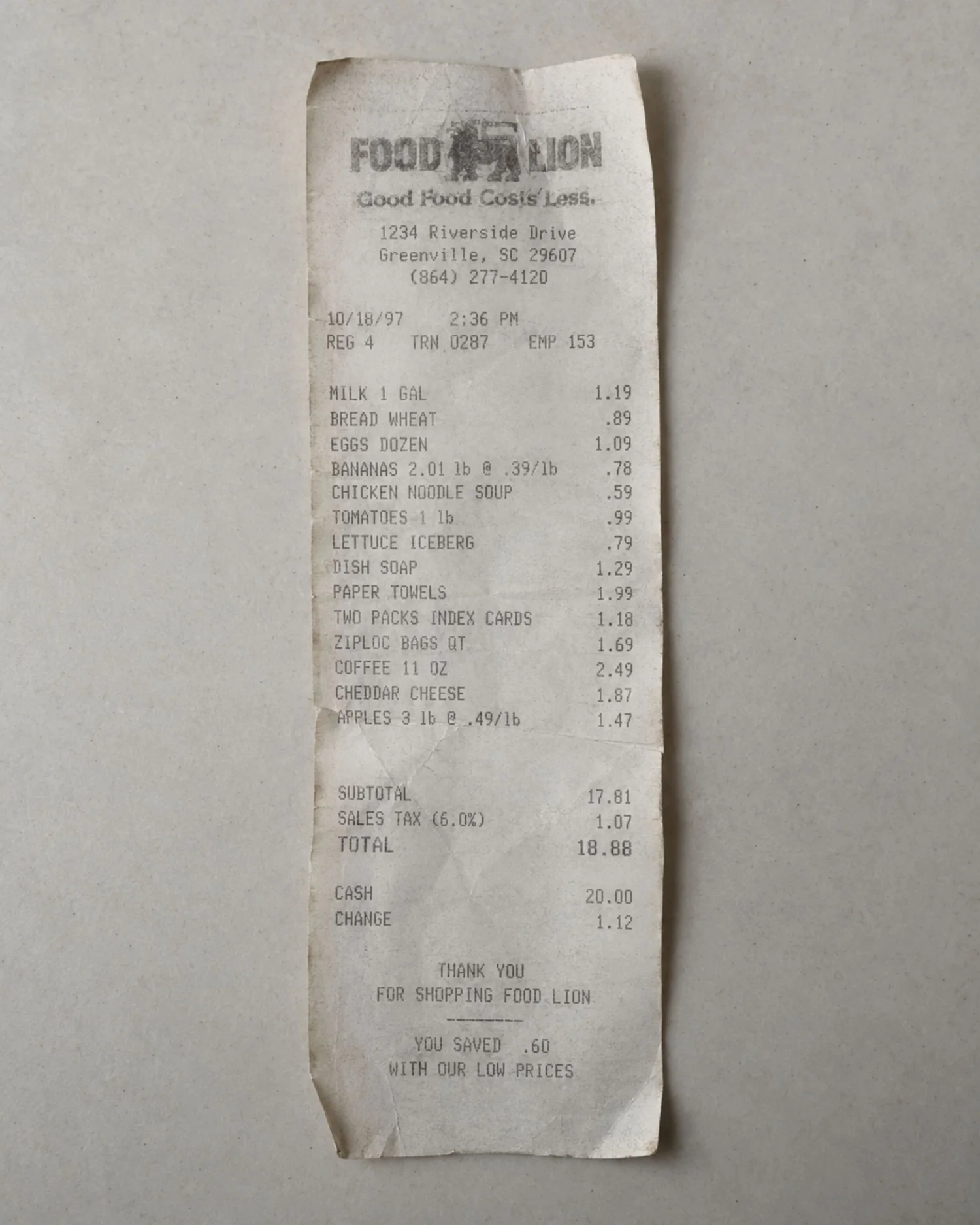 A faded 1997 grocery receipt used as a divider in the recipe box.