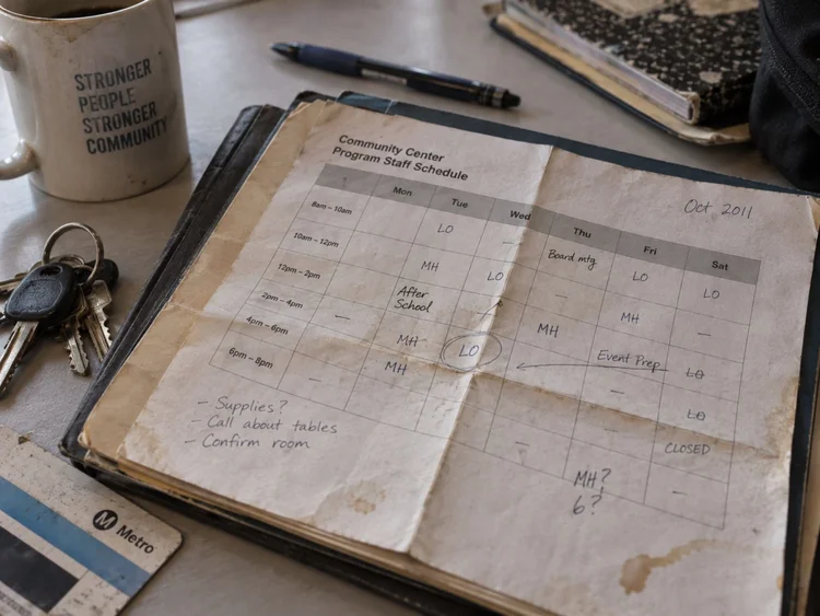 A worn paper and small kept object from an earlier time.