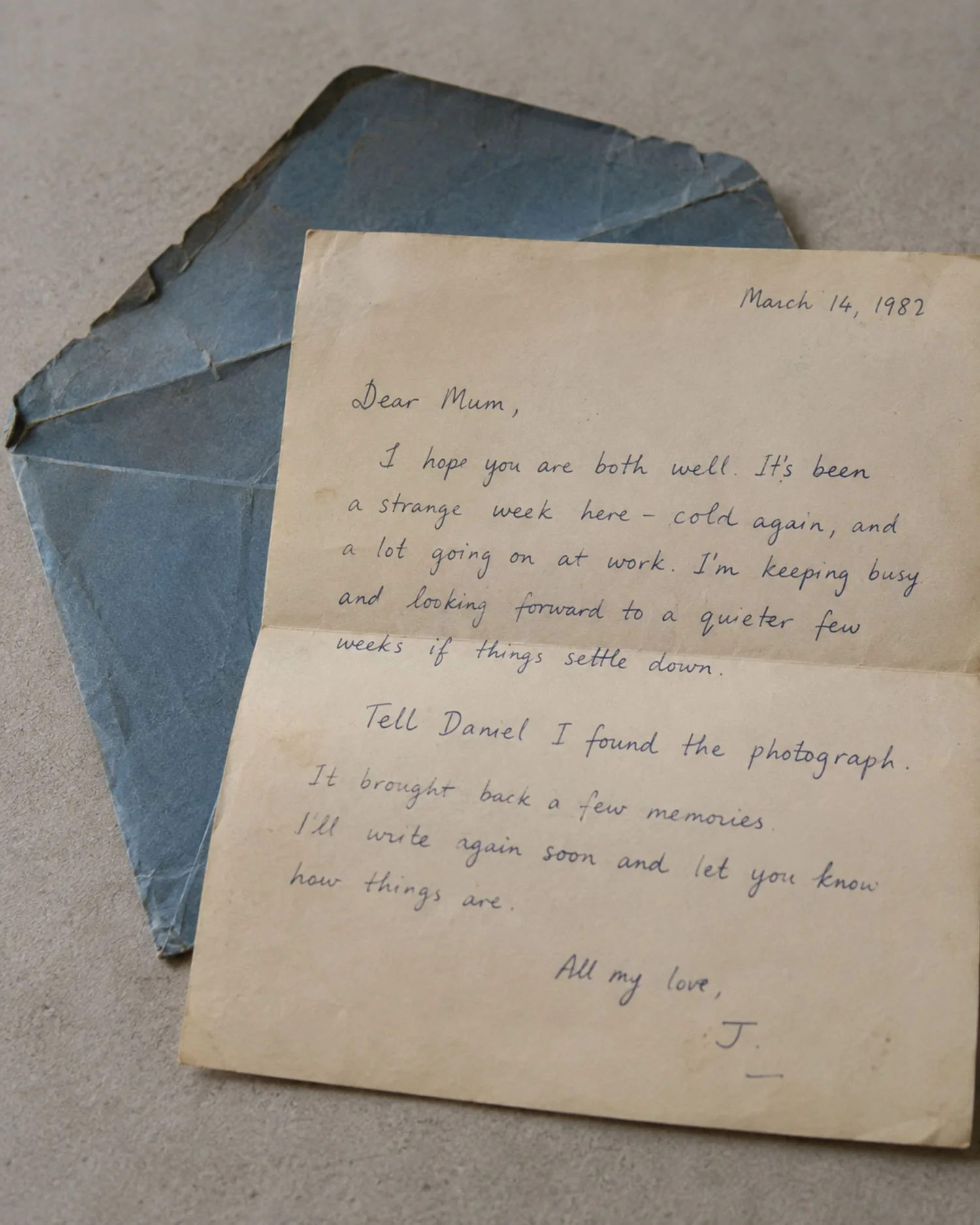 A handwritten letter on aged cream paper.
