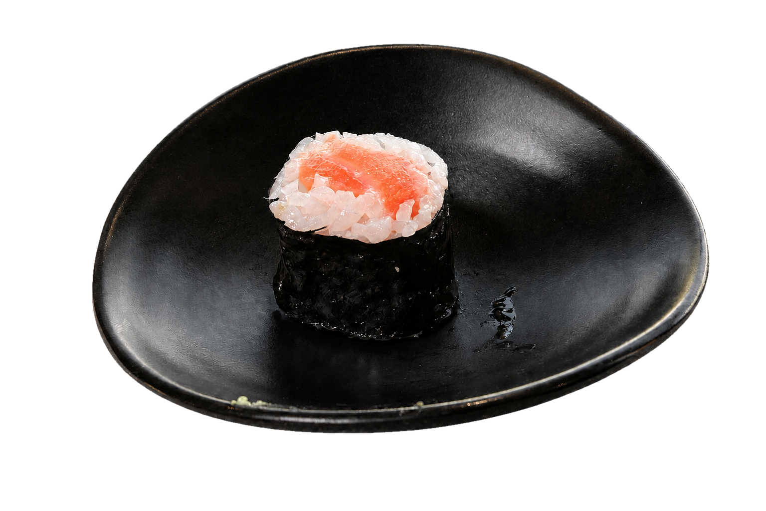 A piece of sushi with raw fish and rice wrapped in seaweed, served on a black plate.
