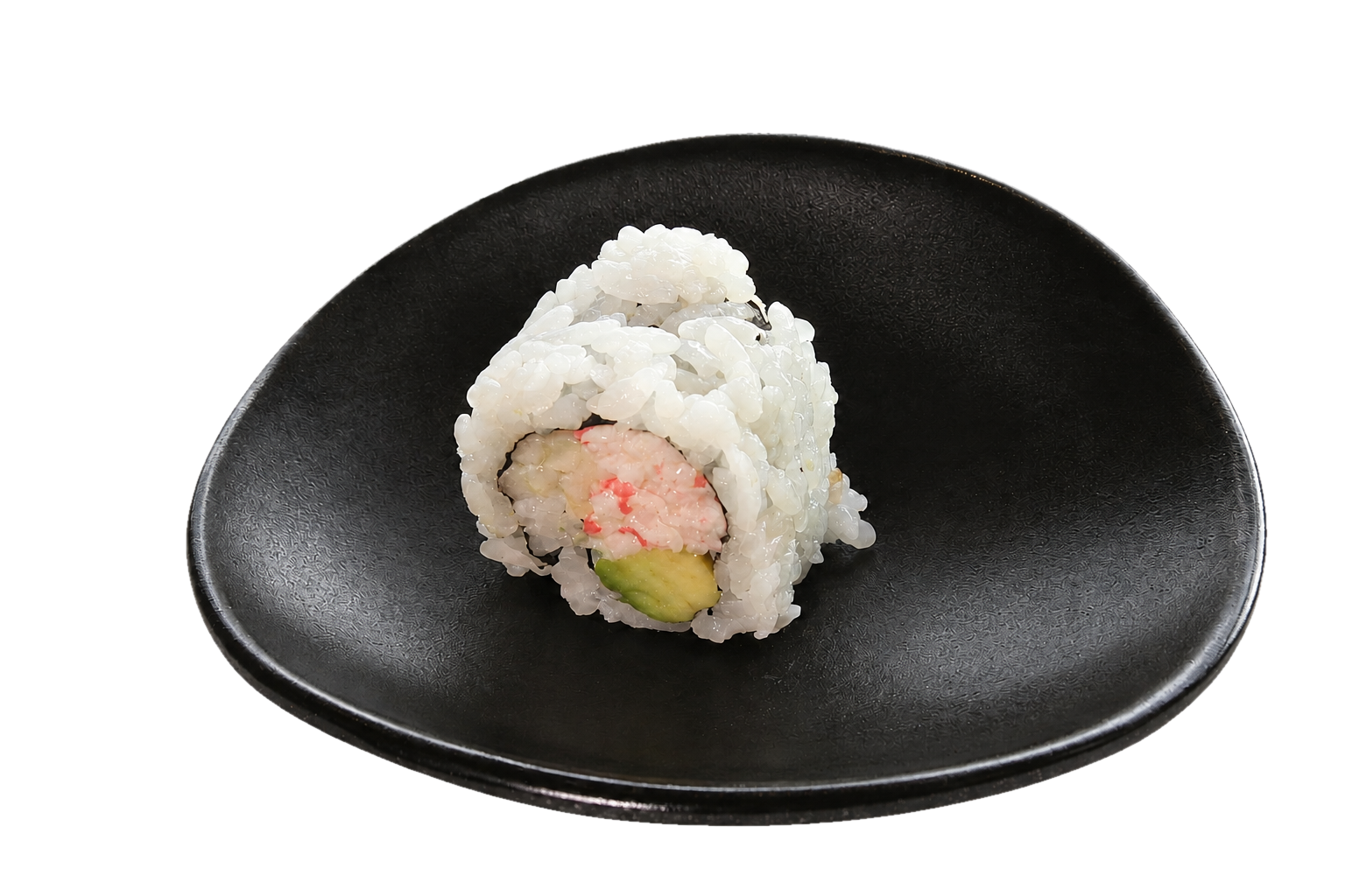 A piece of sushi roll with rice, shrimp, avocado, and seaweed on a black plate.