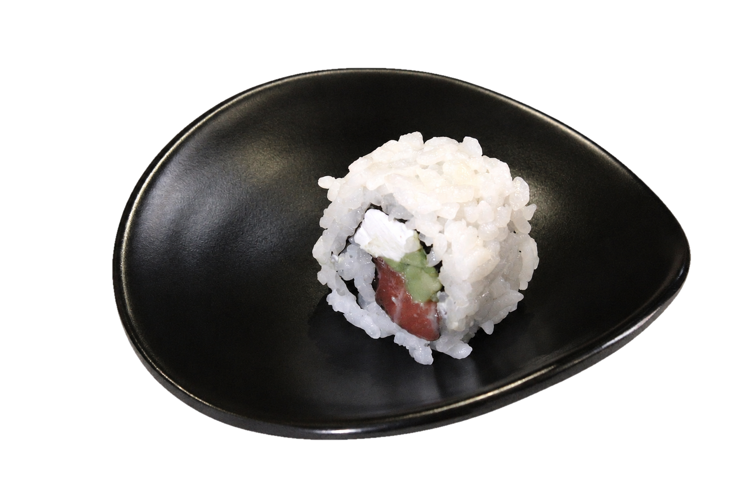 Sushi roll with rice, avocado, cream cheese, and raw fish on a black plate