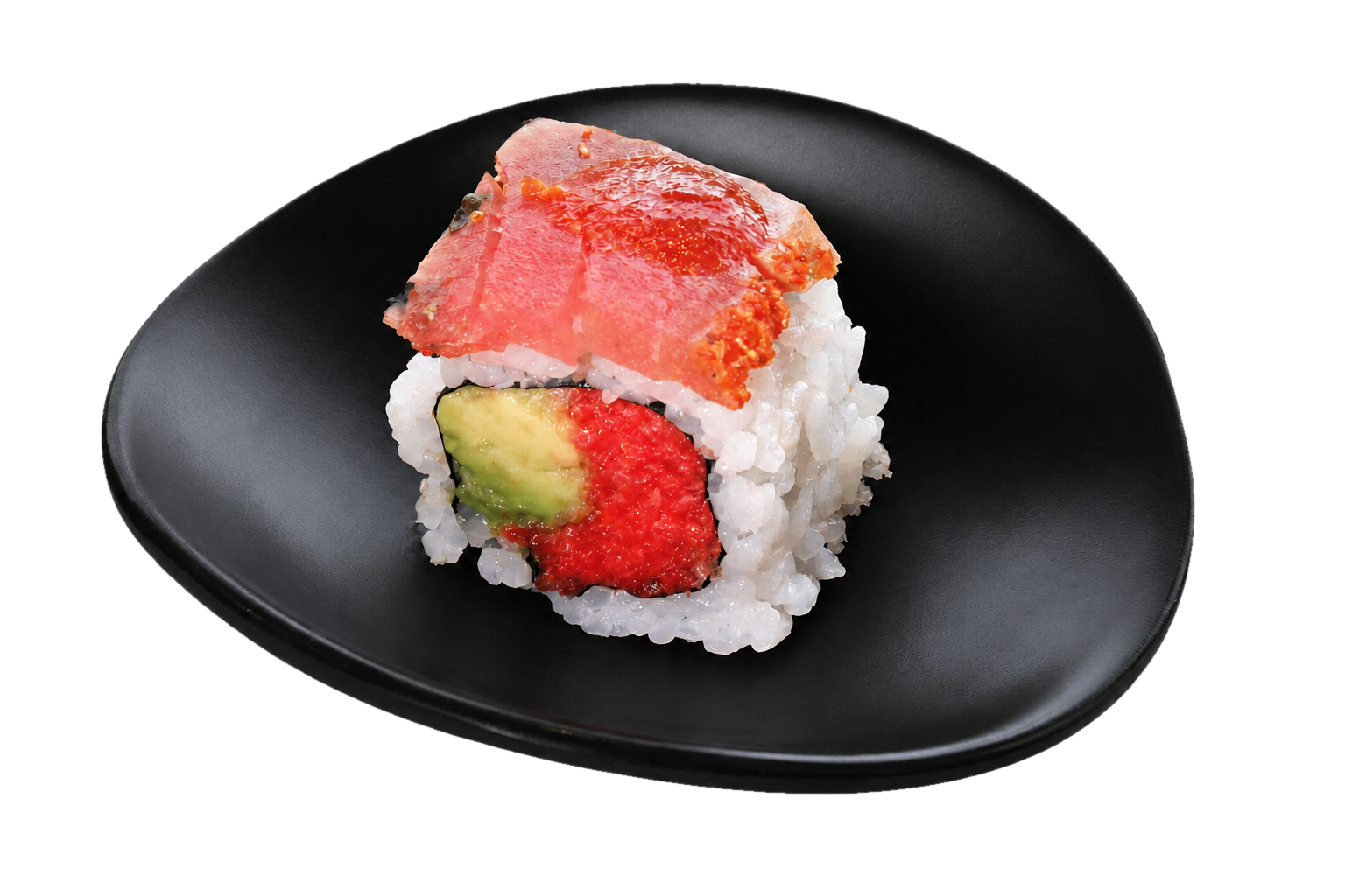 Sushi roll with rice, avocado, strawberry, and fish on a black plate.