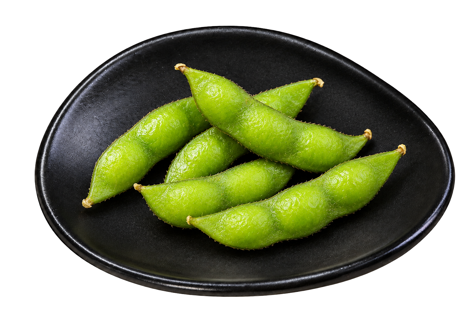 Fresh green edamame soybeans in a black dish