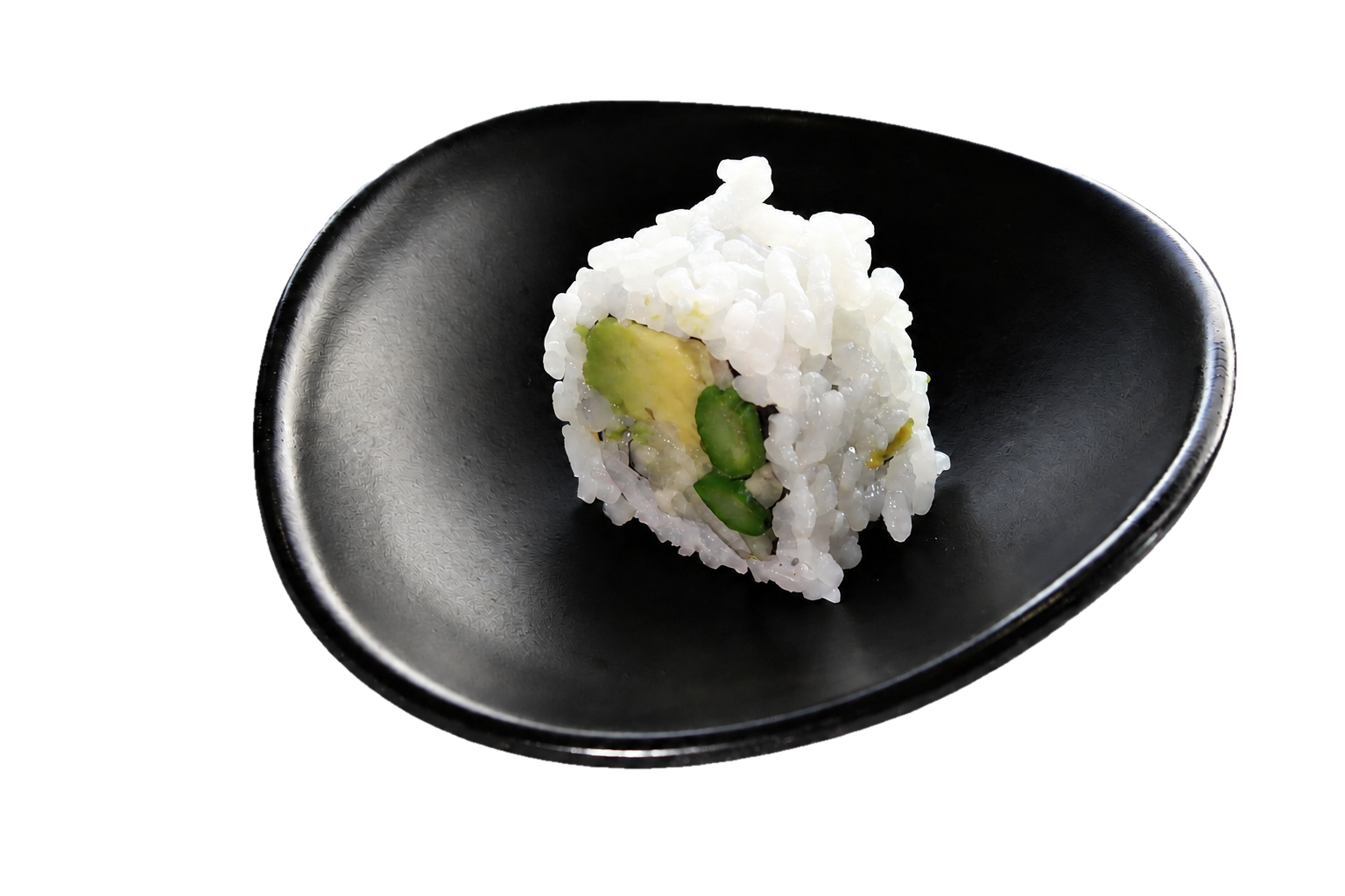 A piece of sushi roll with rice, cucumber, and avocado in a black dish.