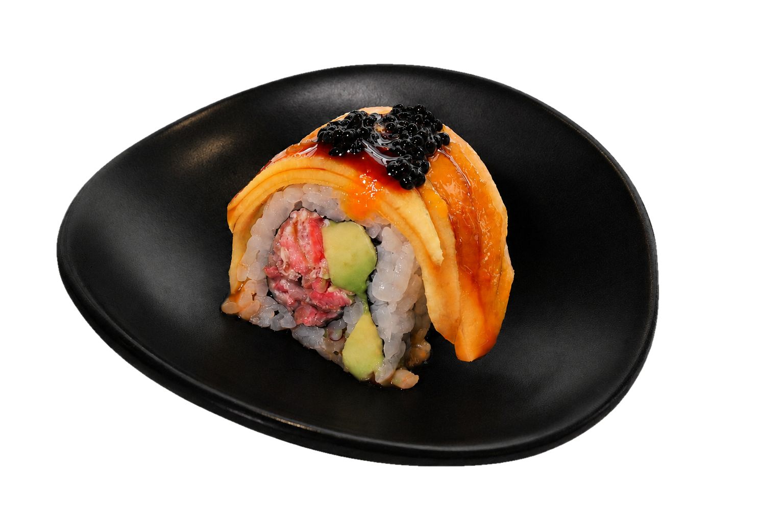 Sushi roll with salmon, avocado, crab, and rice, topped with black caviar, sliced salmon, and sauce, served on a black plate.