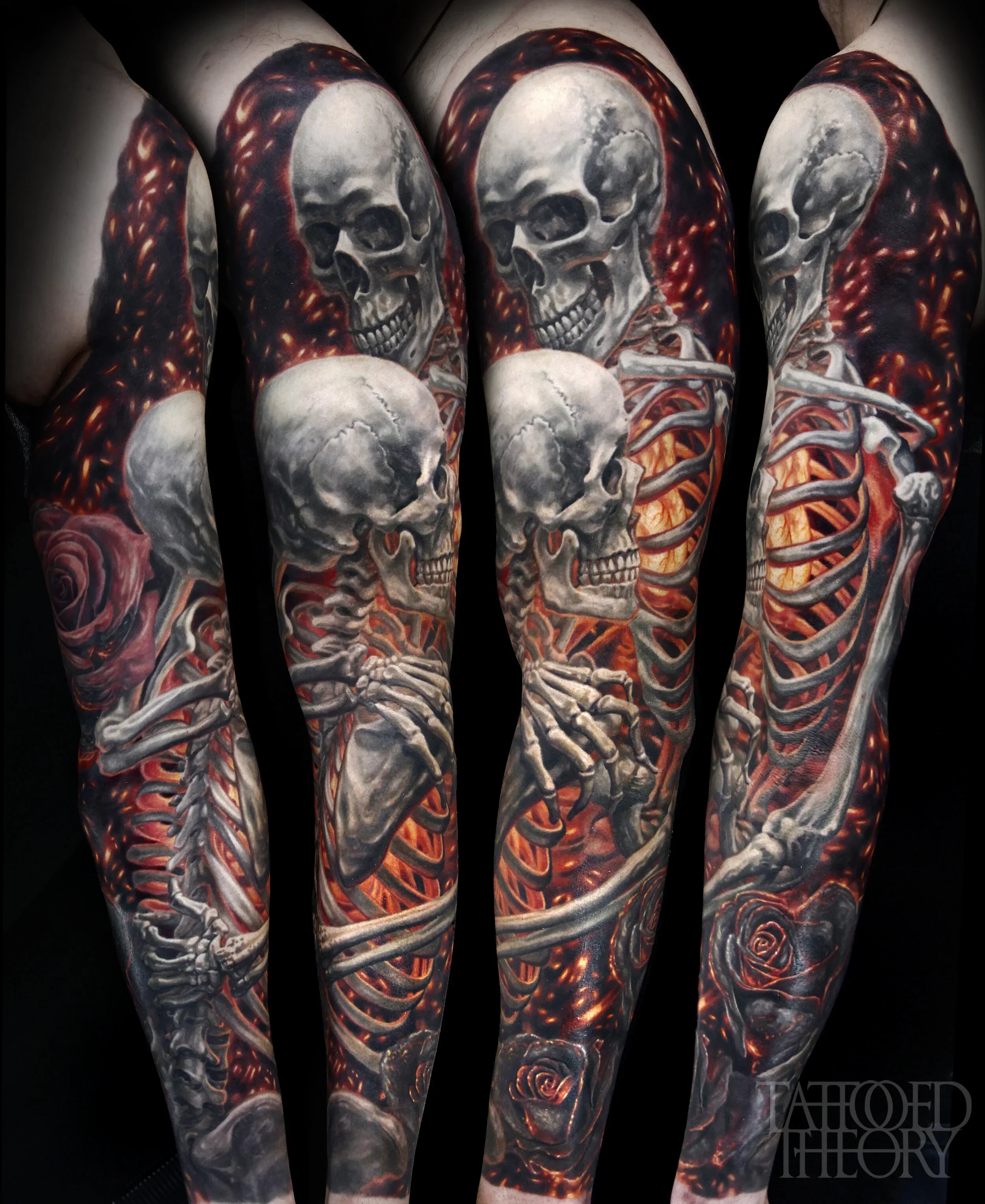 Tattoo of a human skull with flames and a rose, covering a person's arm.