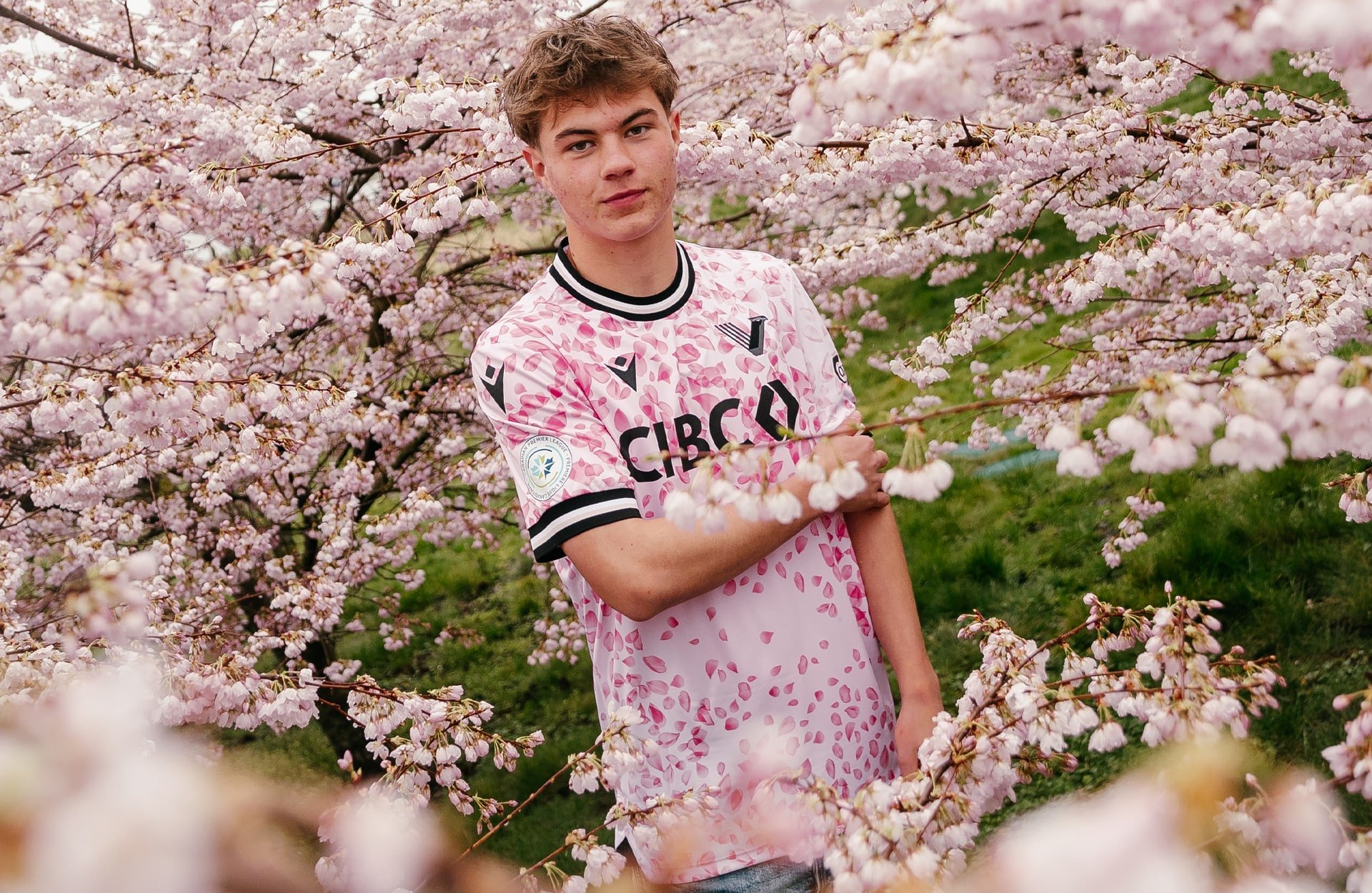 Beau Chevalier photo of Grady McDonnell posing in Vancouver FC's famous 2024 Cherry Blossom Kit