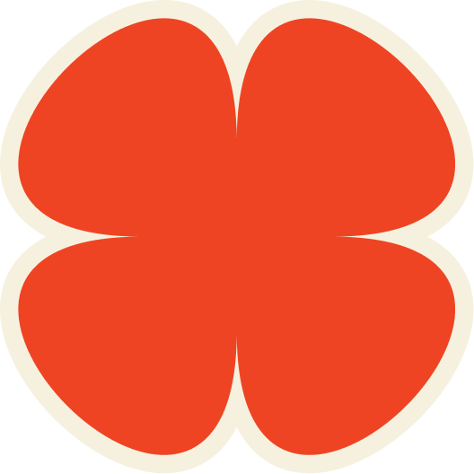 A stylized, four-leaf clover-shaped graphic with a red fill and cream-colored outline.