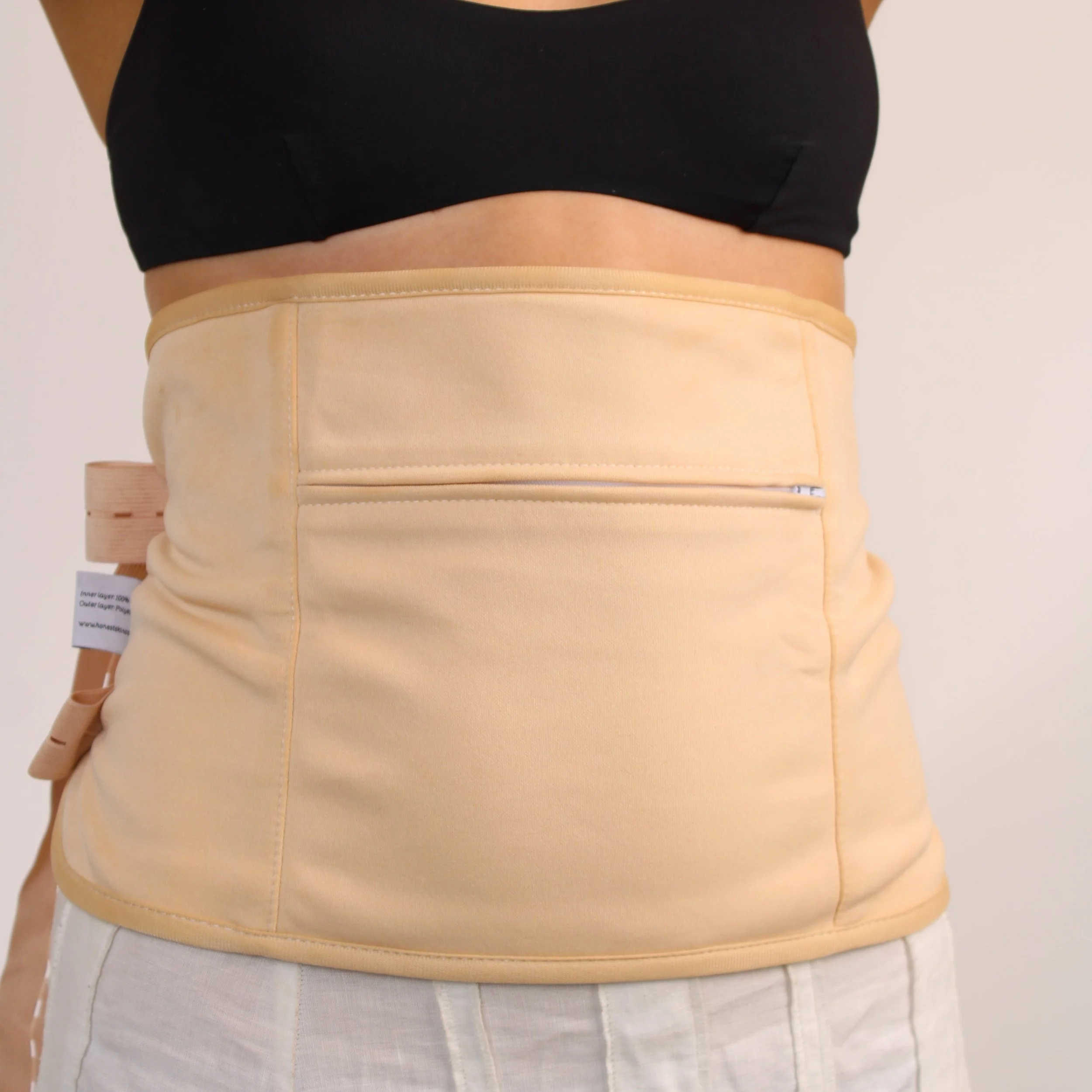 Person_wearing_a_honest_skincare_beige_waist_wrap.jpg
