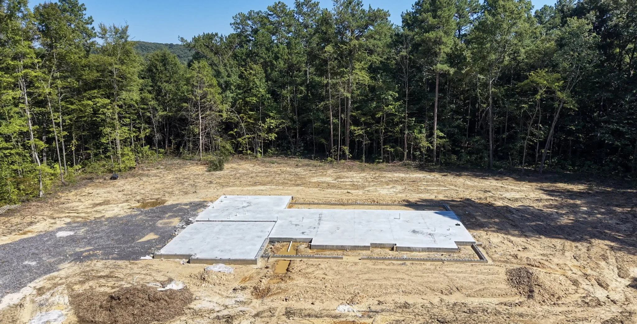 2026-08-25_600-Townsend-Dr_Slab_02_V05-Front-Progress.jpg