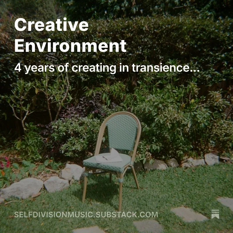A chair with a light blue seat and backrest positioned on grass, with bushes and trees in the background, and overlaid text reading 'Creative Environment, 4 years of creating in transience...'.