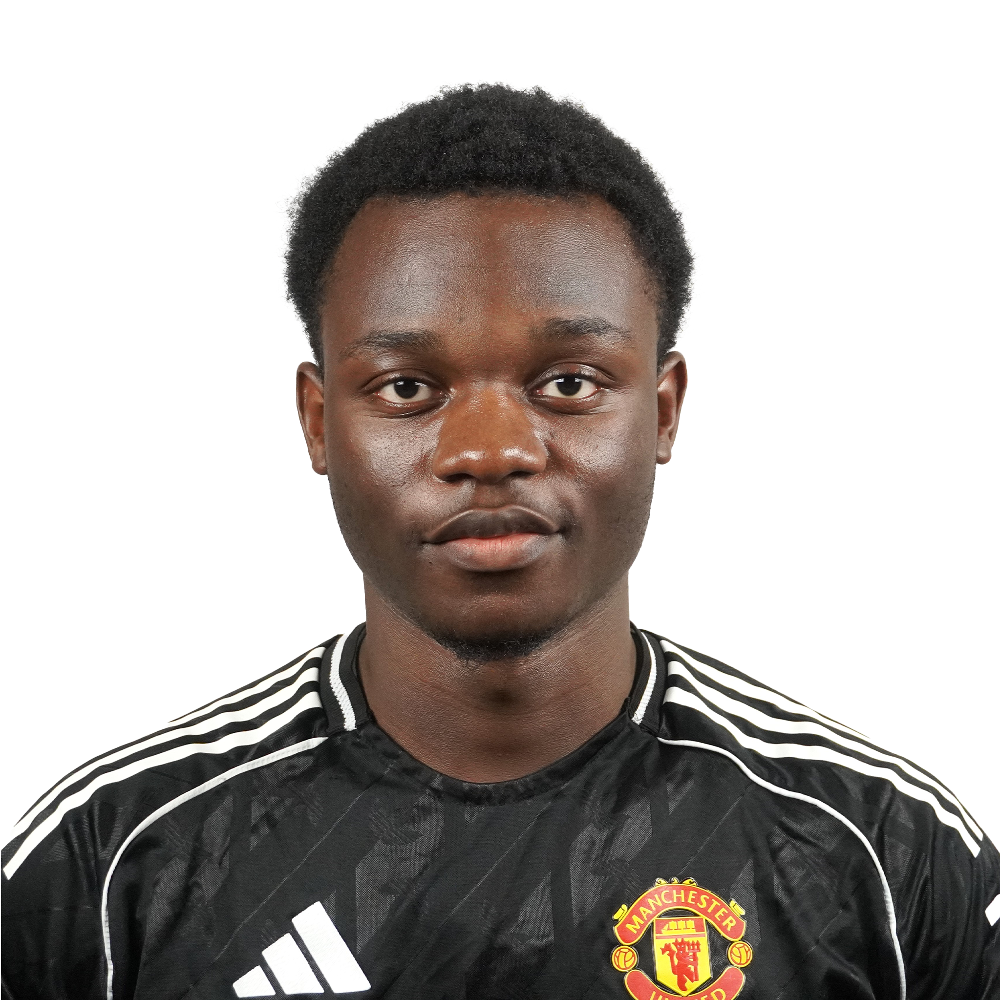 Close-up of a person wearing a Manchester United football jersey with the club's crest visible on the chest.