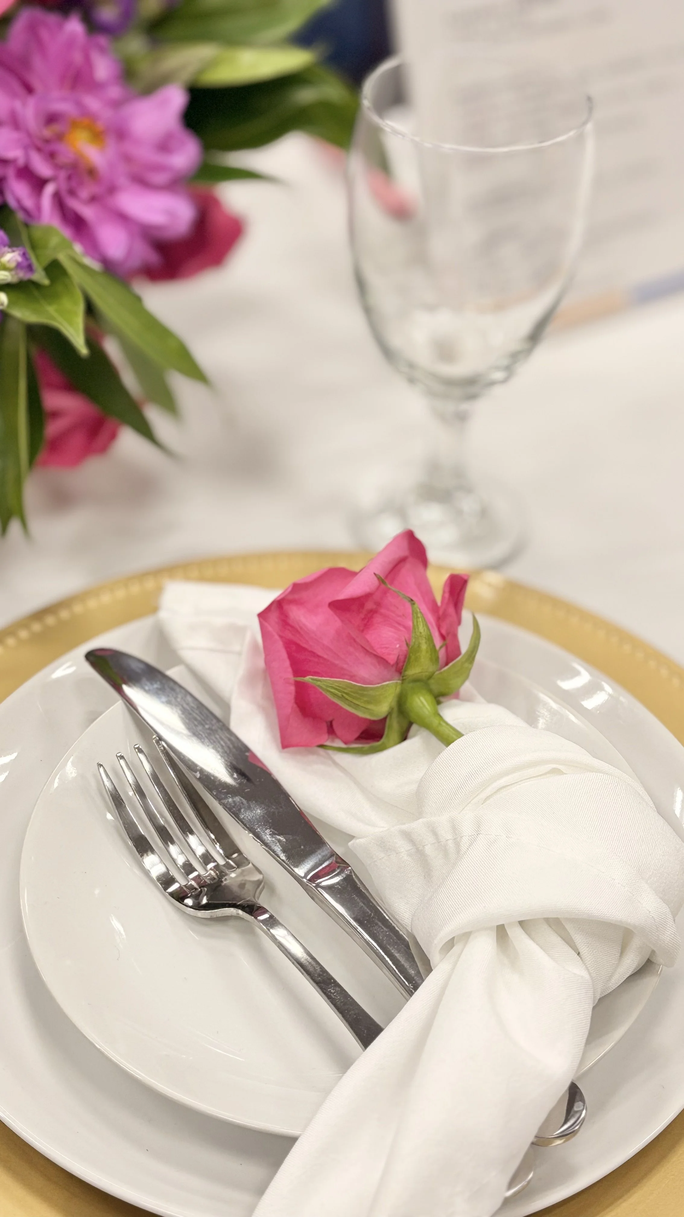 tablescape setup florals plates glass