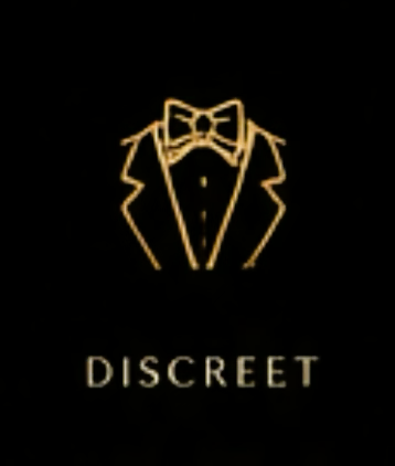 Gold outline of a tuxedo with a bowtie, above the word 'DISCREET' on a black background.