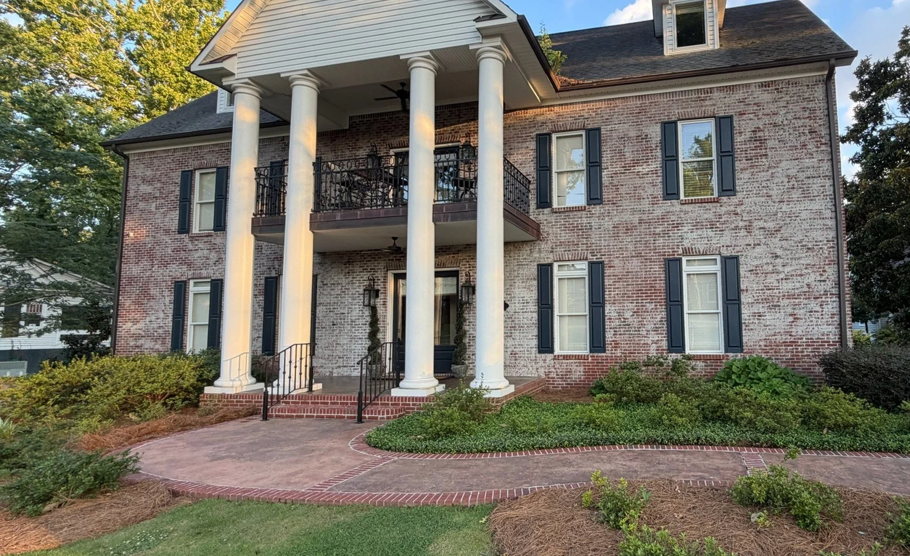 Clean brick home exterior after professional pressure washing in the Memphis area