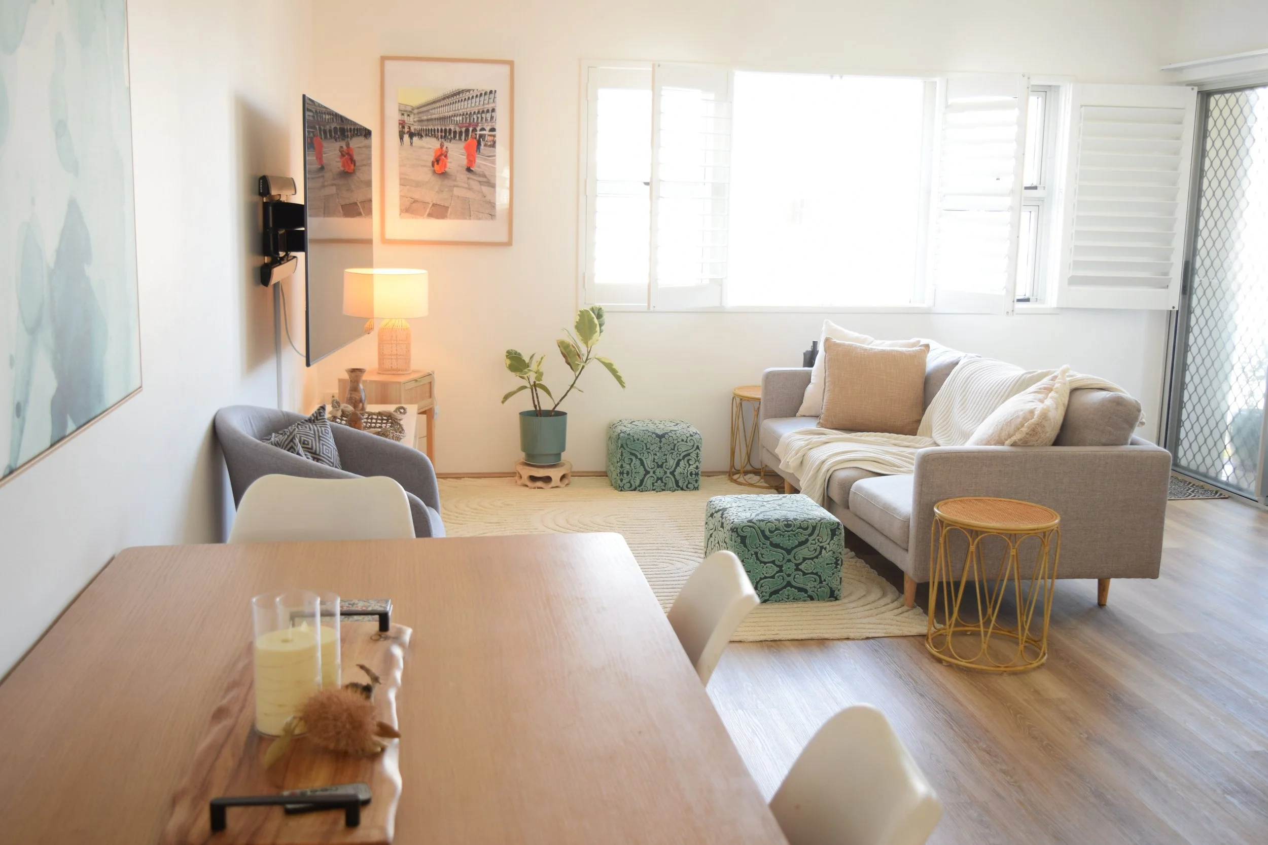 Styled lounge room by The Quiet Space Inside, a calm and sensory-friendly space. Featuring wall art photography by Amanda Morphett