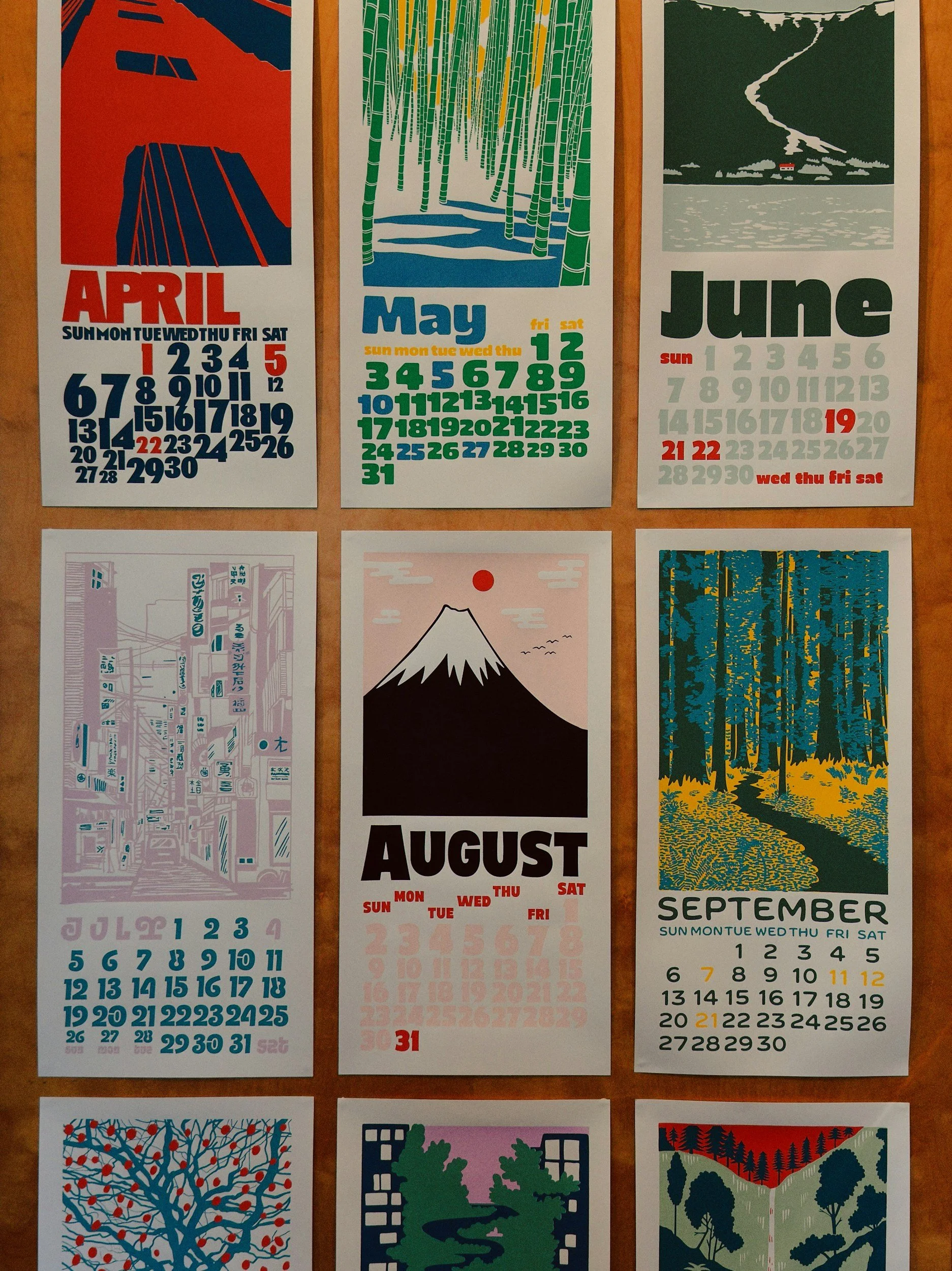 Calendar pages for April, May, June, July, August, and September, each with colorful illustrations and month details.