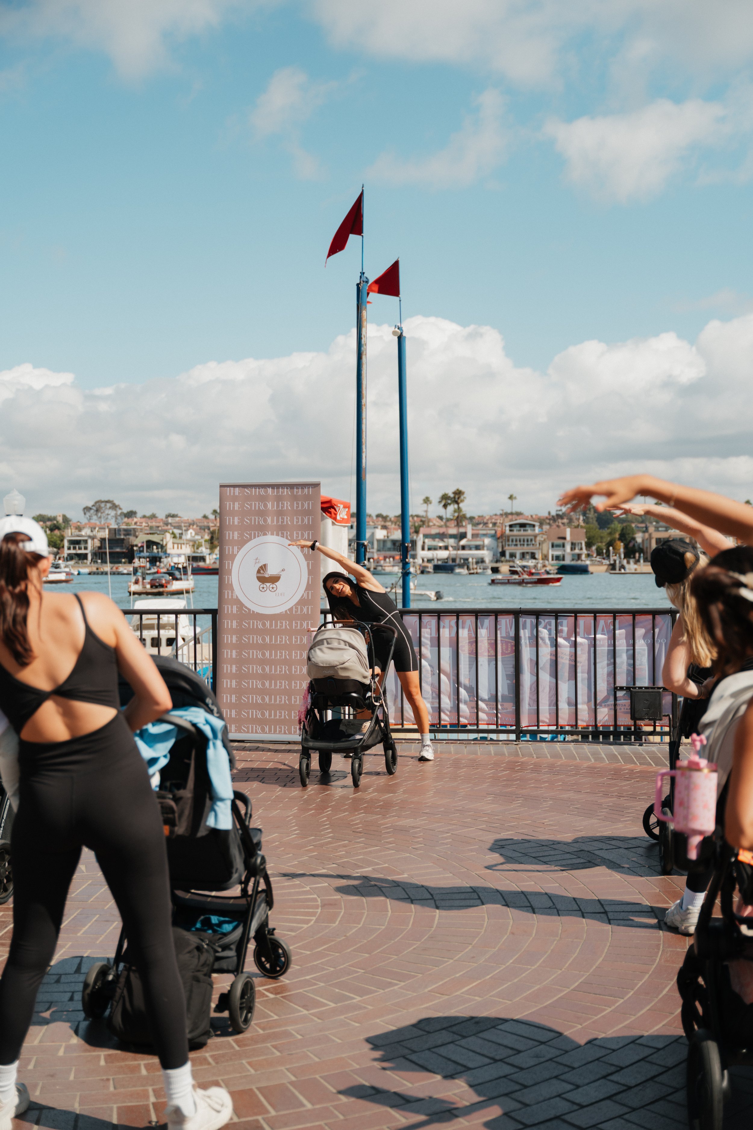 the stroller edit workout filmed at balboa bay fun zone in newport beach california orange county. led by amanda deremer
