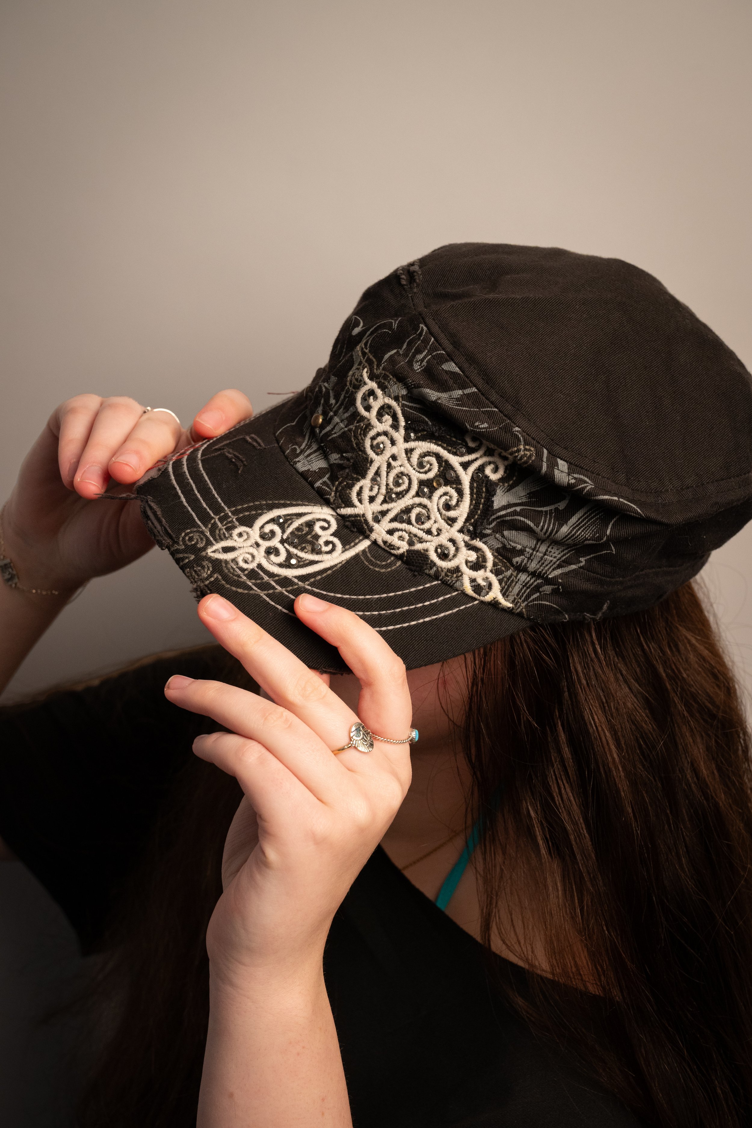 Black cadet cap swirly cross embroidery
