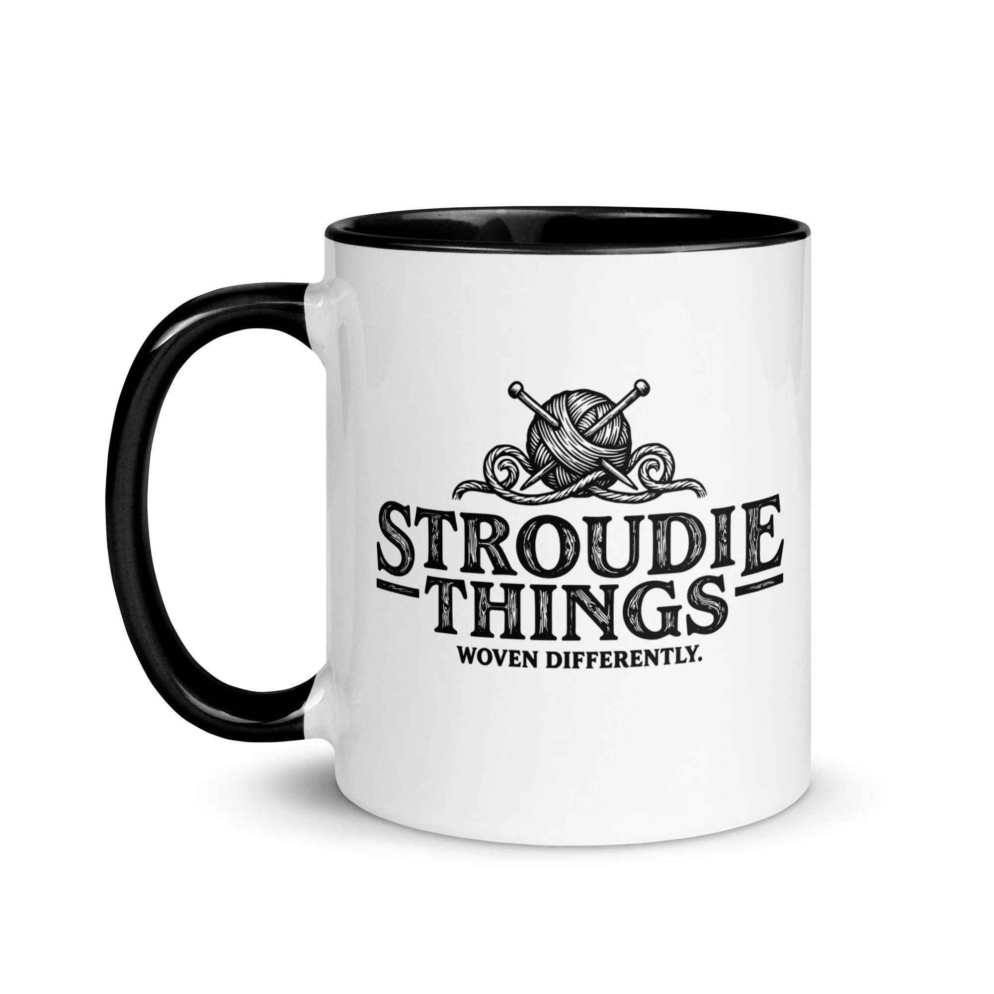 Stroudie Things ceramic mug with black handle featuring knitting needles woodcut illustration