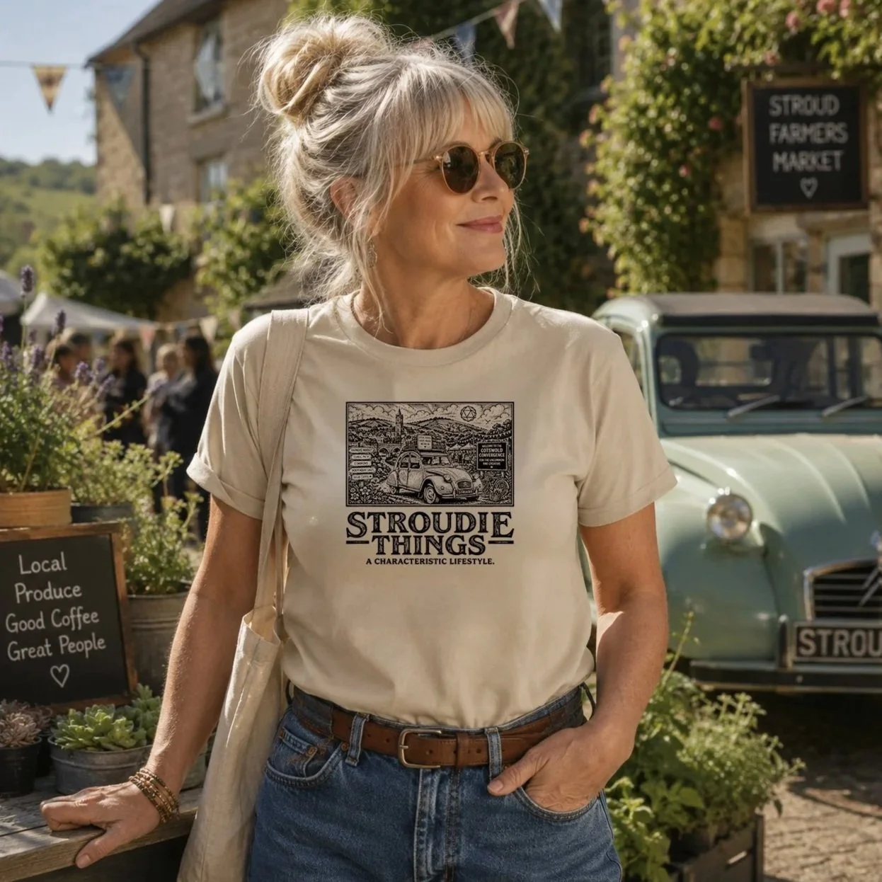 cotswold-convergence-2CV-organic-unisex-organic-cotton-worn-by-older-female-2CV-car-in-background
