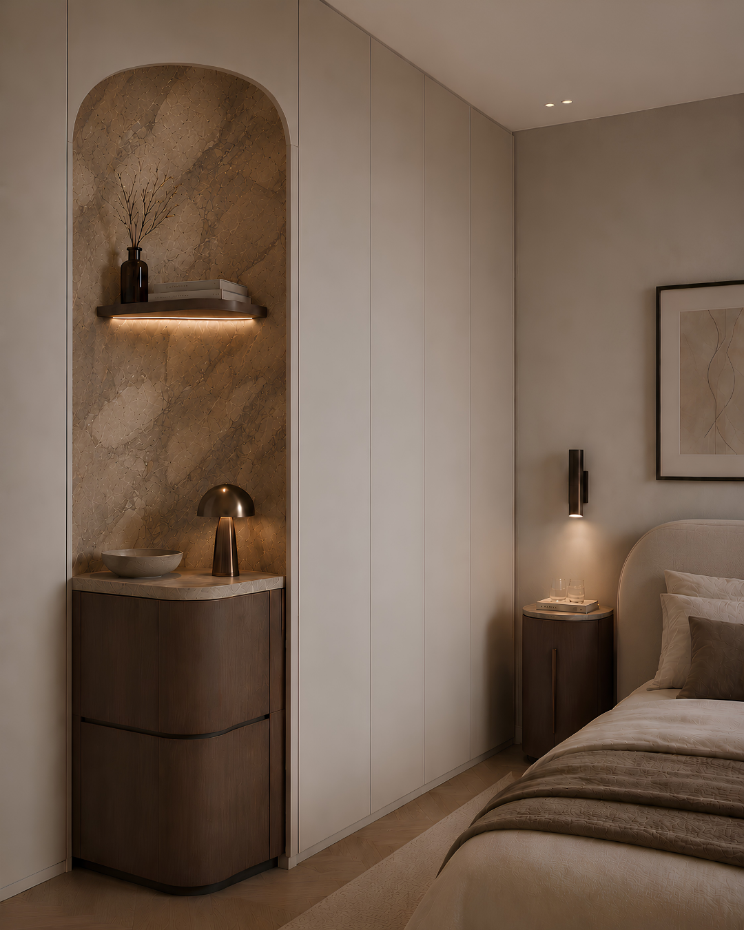 Close-up of a cozy bedroom corner with a bed, nightstand, and a decorative decor niche with lighting and vases.
