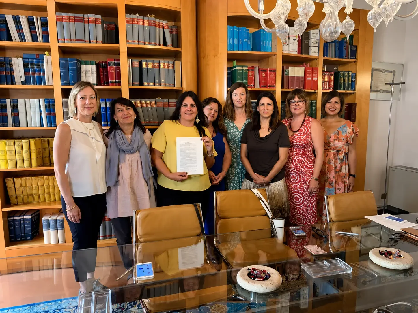 International Ladies Group of Padova committee members signing official non-profit statutes.