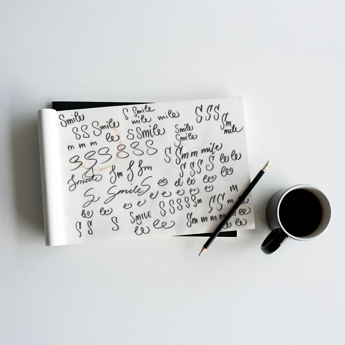 Handwritten logo sketches from the Smile Immo design process.