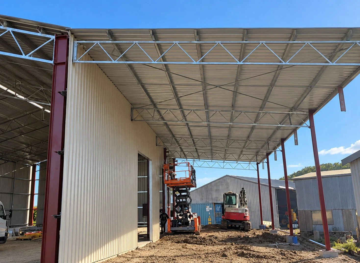 Industrial awning extension showing steel framing and roof sheeting