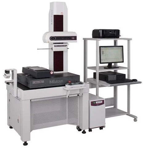 A piece of scientific or medical laboratory equipment with a computer and accessories.