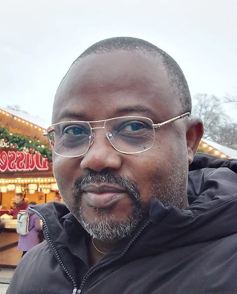 Image of man wearing glasses.