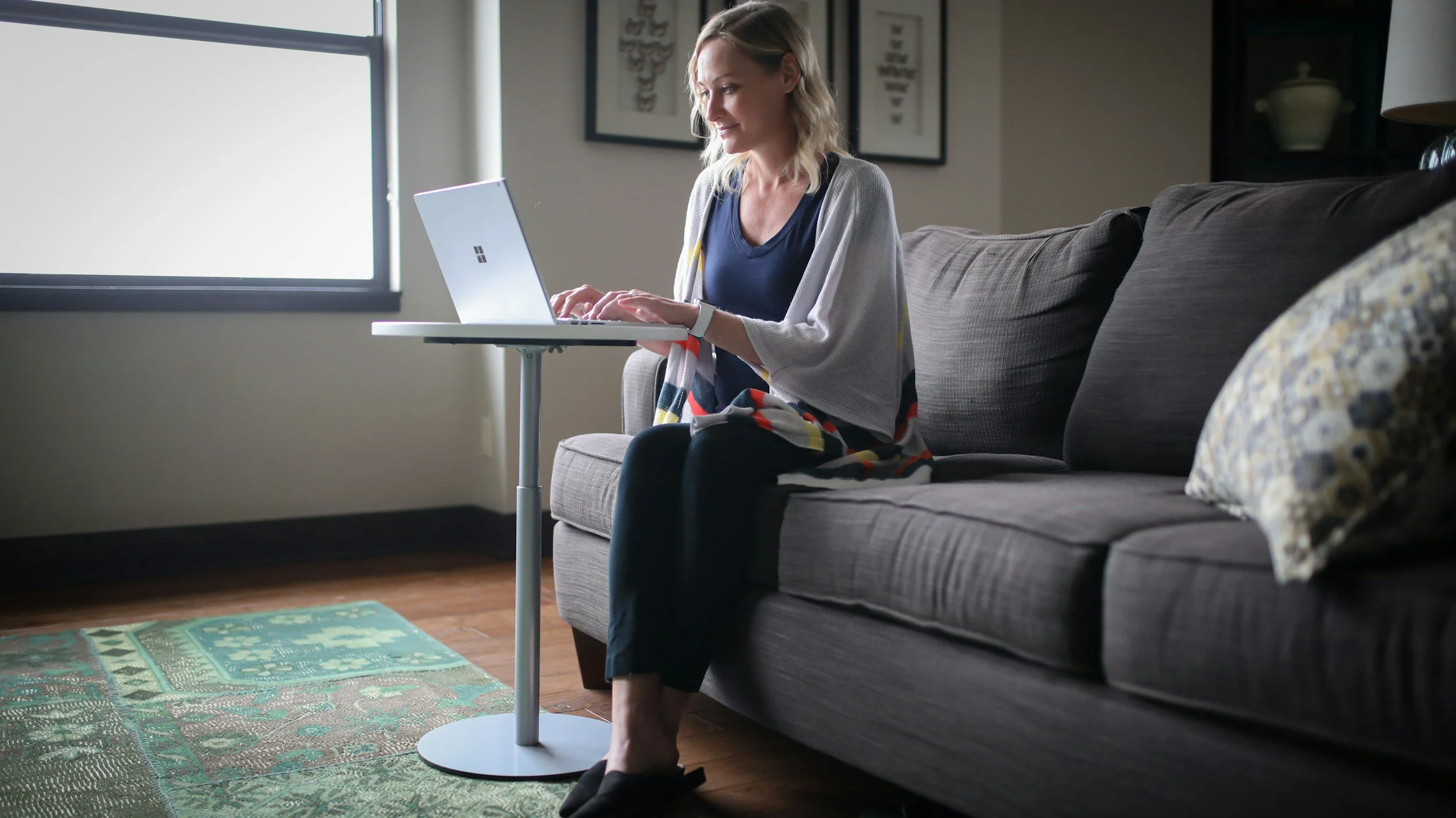 Woman at home on laptop
