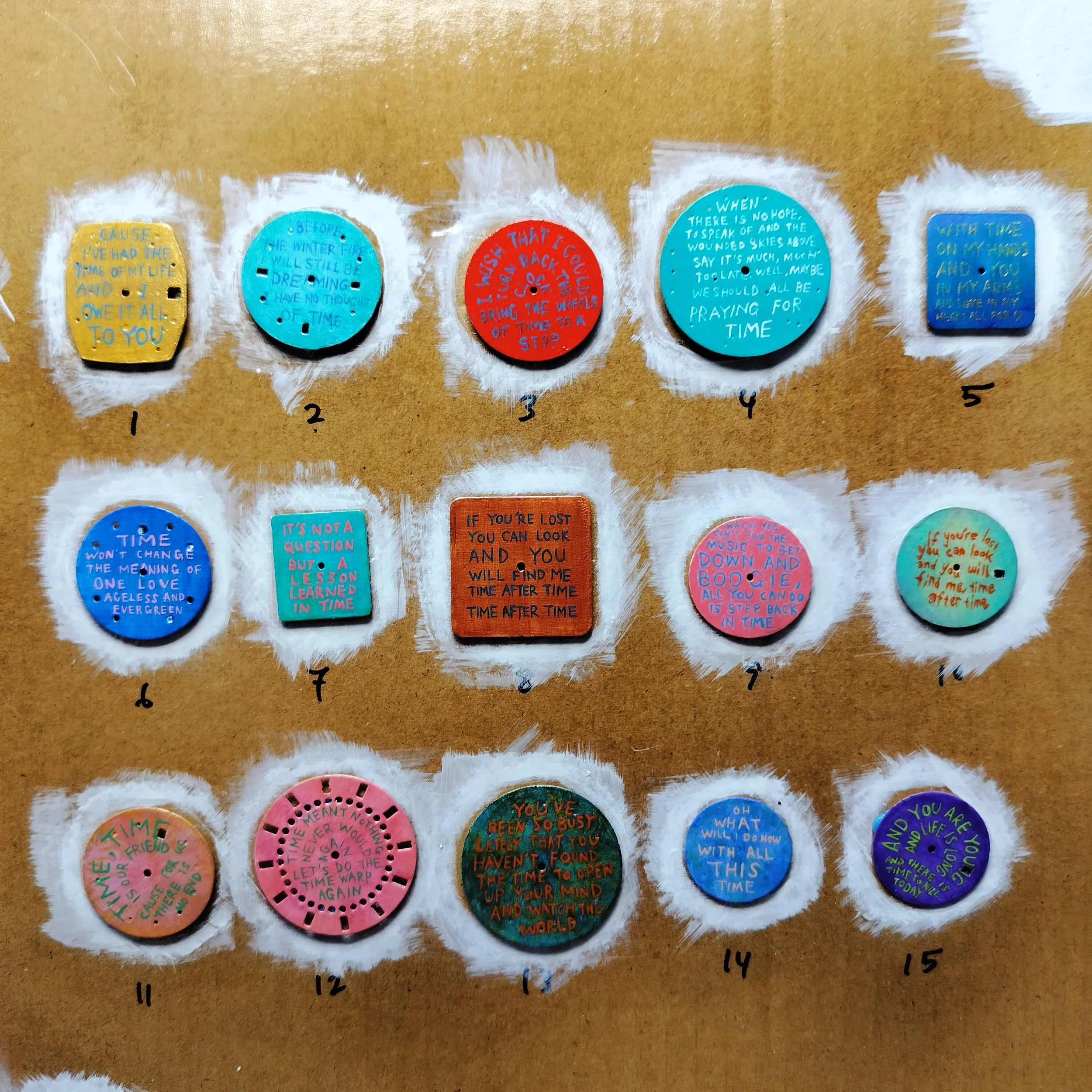 Painted "Time Talisman" dials prepared for varnishing 