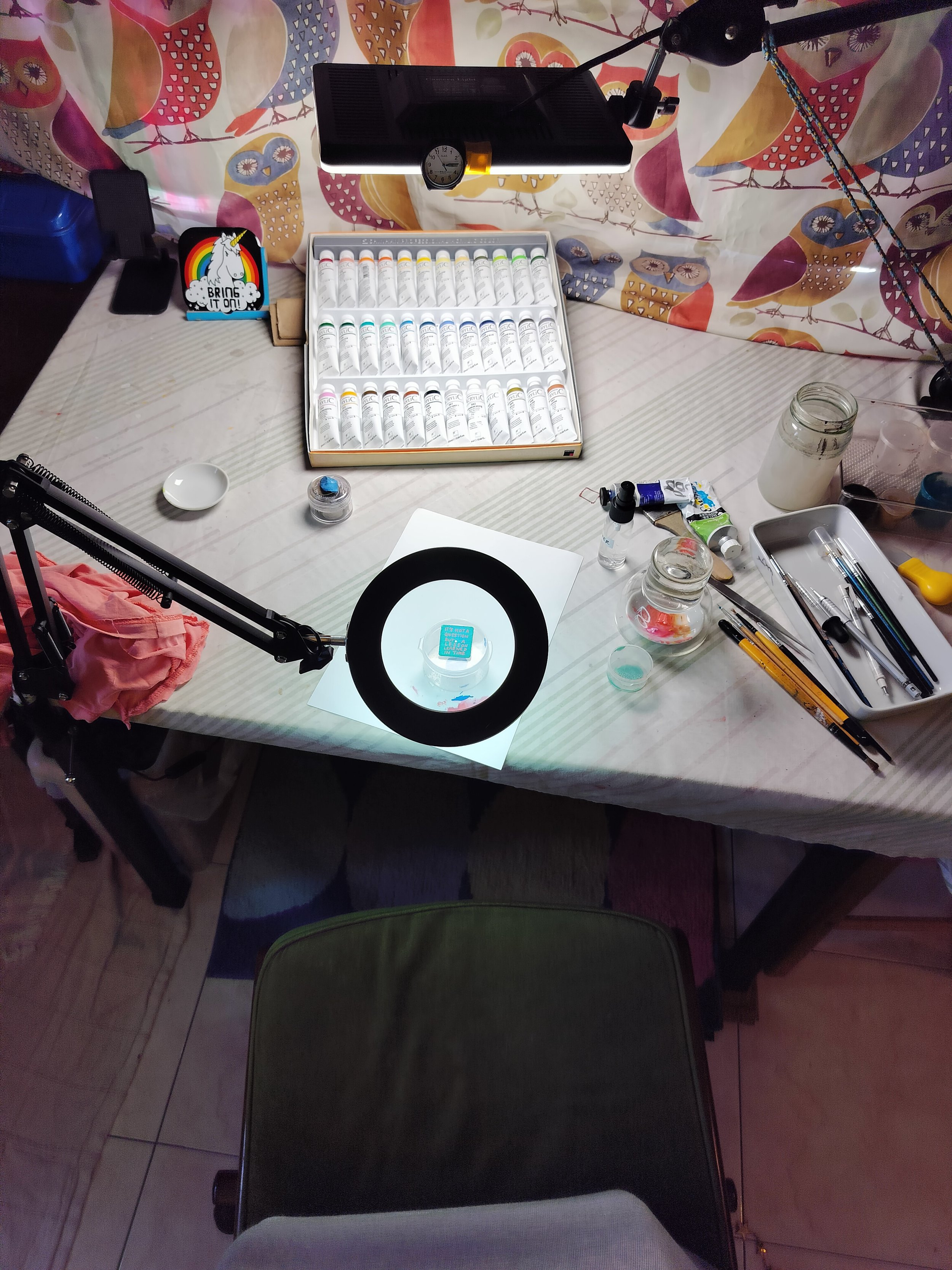 Studio setup for painting Time Talisman using a magnifying glass with LED and teeny tiny brushes.
