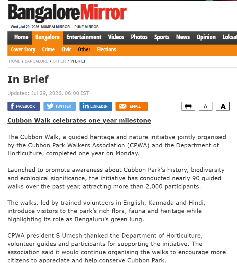 Screenshot of a news article from the Bangalore Mirror website titled 'In Brief' dated July 29, 2026, about the first anniversary of the Cubbon Walk heritage and nature initiative in Bangalore, India.