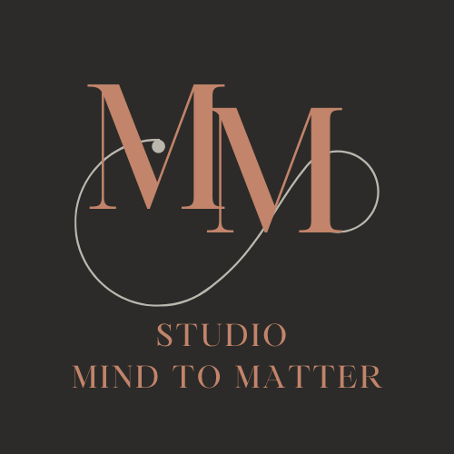 Logo for 'Studio Mind to Matter' featuring large pink letters 'M M' on a black background, with the words 'STUDIO MIND TO MATTER' below in smaller pink font, and a white curved line crossing through the design.