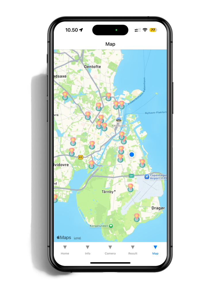 Smartphone displaying a map of Copenhagen, Denmark, with multiple location markers and a blue dot indicating the user's position near Copenhagen Airport.