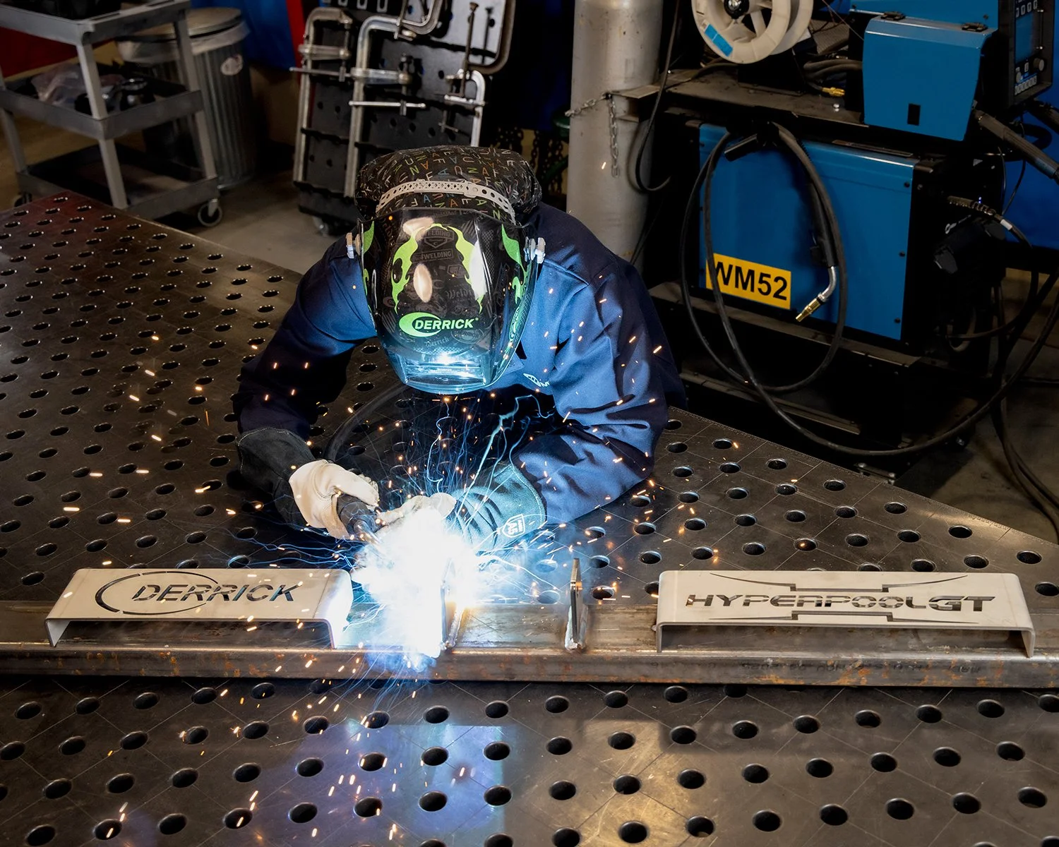 Industrial Welder Fabricating Metal in Manufacturing Workshop