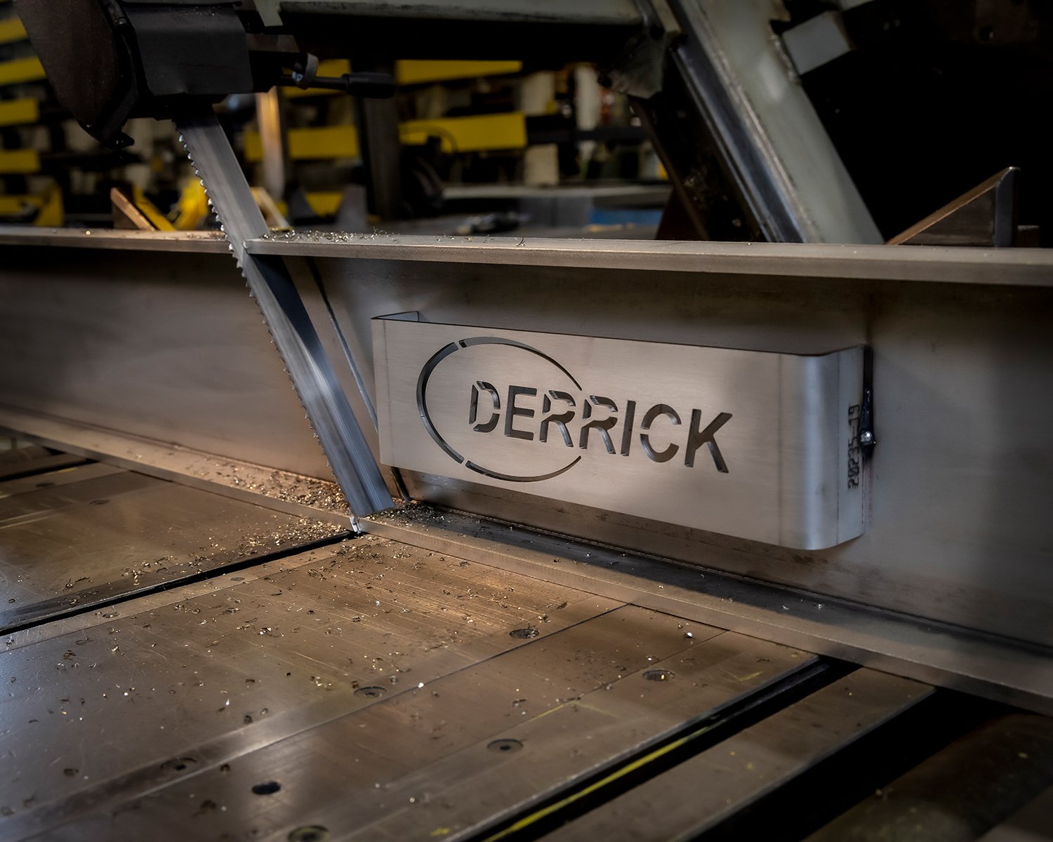 Company Logo Laser Cut into a Piece of Steel