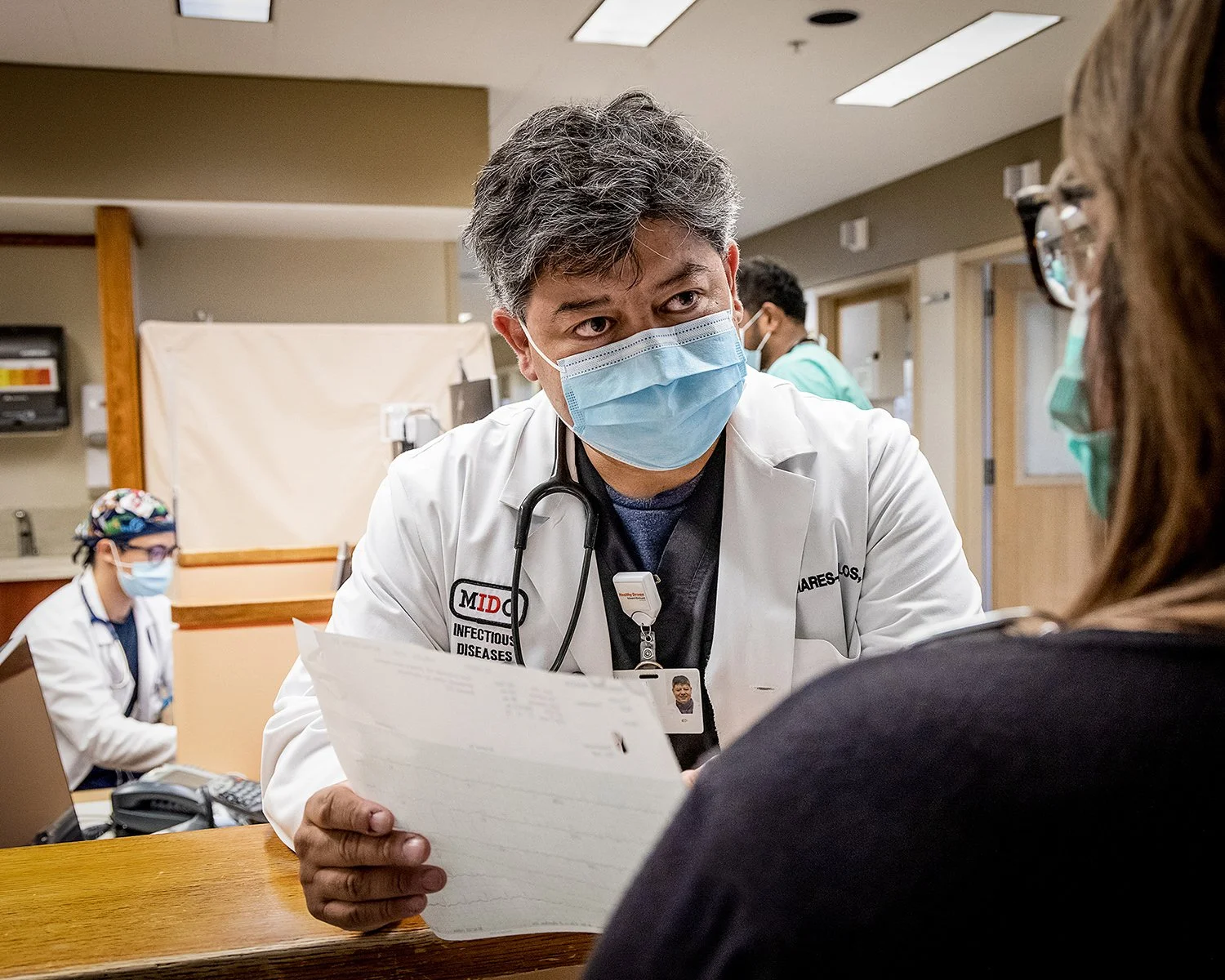 006_Dr with paper.jpg