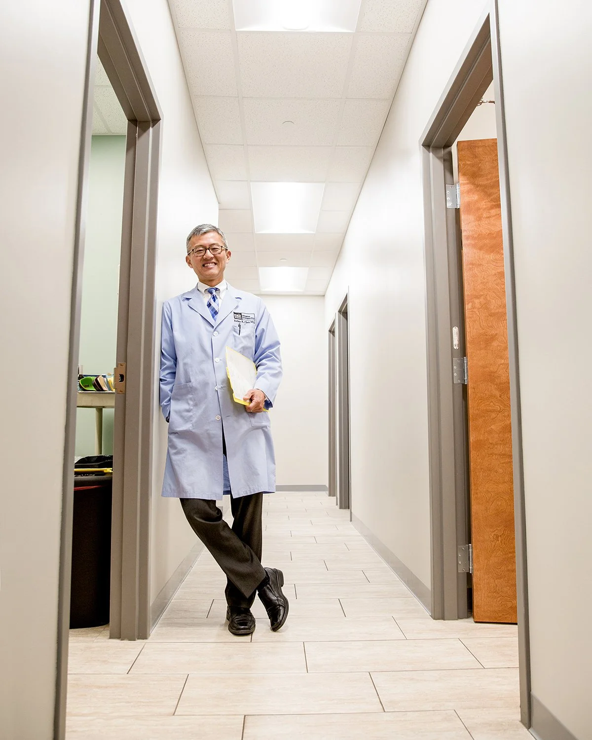 Corporate Healthcare Portrait Photography of an Asian Male Physician in a Hospital Interior, Captured by an Advertising Medical Photographer for B2B Brand Marketing Campaign