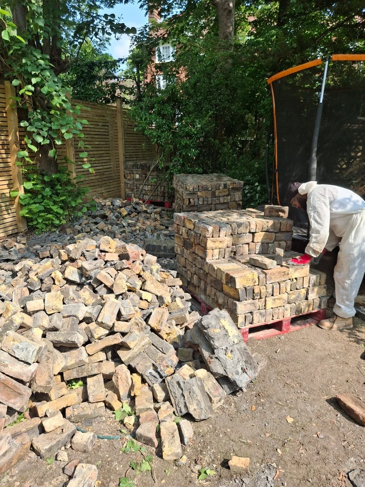 palletizing-reclaimed-bricks-after-manual-demolition.JPG