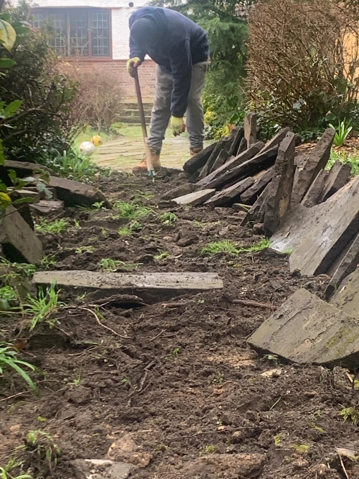 lifting-reclaimed-yorkshire-paving-stones-wimbledon.jpg
