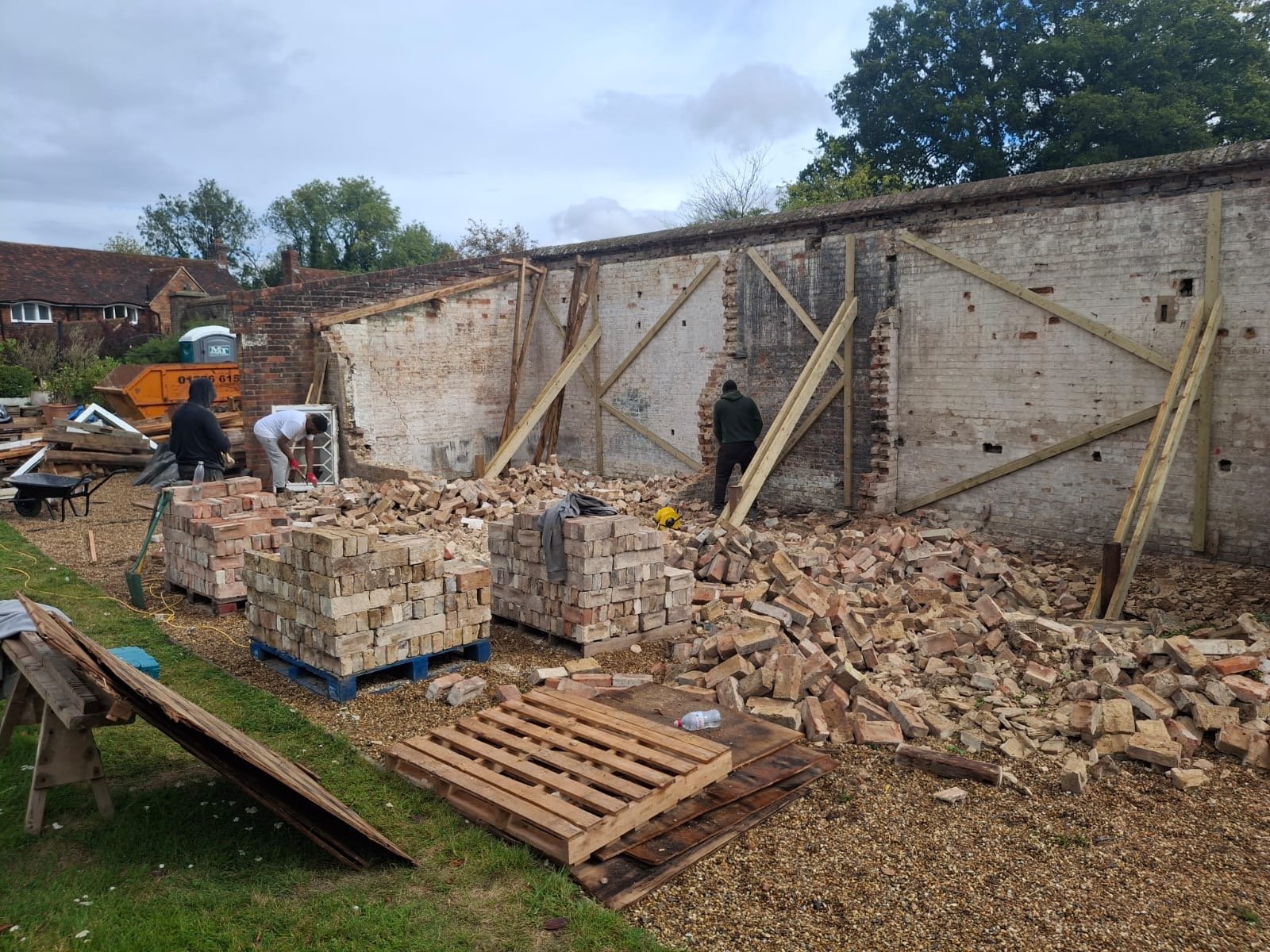 clearing-debris-after-stable-demolition.JPG