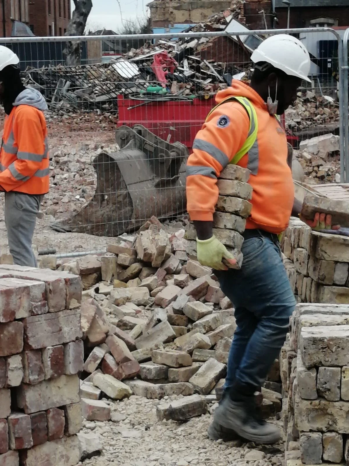 dulwich-hospital-worker-handling-salvaged-brick-06.JPG